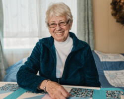 Corrine Groskleg, Golden Lake, age 77. Corrine works on a quilt. Each of her grandchilden has their own quilt, made with love by Corrine.