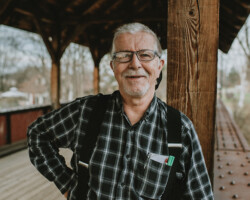 Dan Harrington, Killaloe, age 73. Dan has lived in Killaloe all his life and once owned the Killaloe Hardware Store. Now retired, he spends his time volunteering in the
community he loves. This photo was taken on the bridge in Station Park.