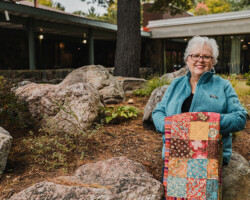 Linda Shulist, Wilno, age 66. Linda is outside of the Valley Manor, where she worked for many years before recently retiring. She is loving the freedom to pursue her many passions, like quilting.