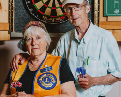 Lynne Postill and Bruce Burnett, Killaloe. Ages: Lynne 80, Bruce 75. Lynne and Bruce met playing darts at the Wilno Tavern. Both are proud members and supporters of the Killaloe Lion’s Hall, where this photo was taken.