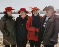 Red Hats: Pearl Smith, Shirley Davis, Liz Beasley and Donna Smith. The wild Red Hat women photographed in Barry’s Bay at Lakeshore Park.