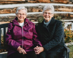 Aurelia Skebo and Betty
Mullin, Killaloe. Ages: Aurelia 93, Betty 85. Sisters Aurelia and Betty sit outside of their family homestead, where Betty was born.